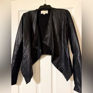Hinge Drape Front Black Leather Women's Cropped Jacket with knit sleeves.